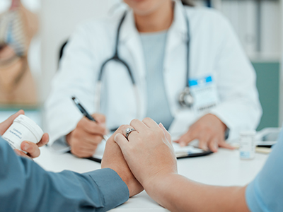 Doctor consulting couple about IVF treatment in Dubai