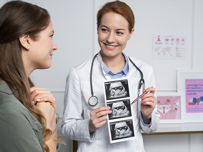 Smiling doctor explaining advanced reproductive technology