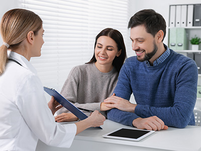 Couple consulting a fertility doctor about treatment options